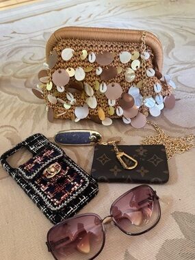 Brand new Hand woven texture soft gold and shell clutch to hold all essentials